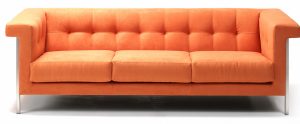 Bottlebrush buttoned fabric sofa in oraange fabric